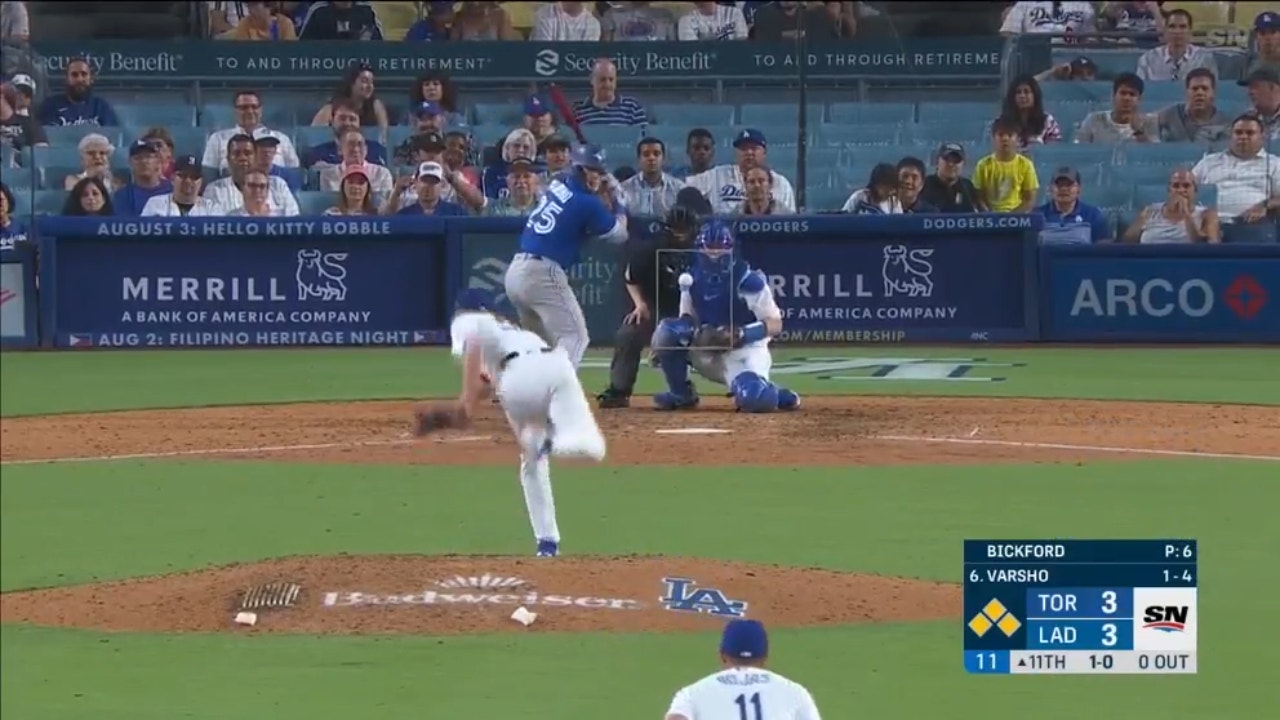 Daulton Varsho's two-run double in the 11th inning helps lift the Blue Jays over the Dodgers