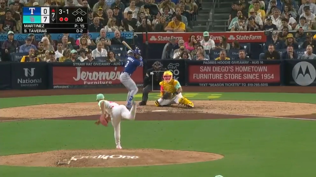 Manny Machado makes an incredible throw to first to close out the inning for the Padres against the Rangers