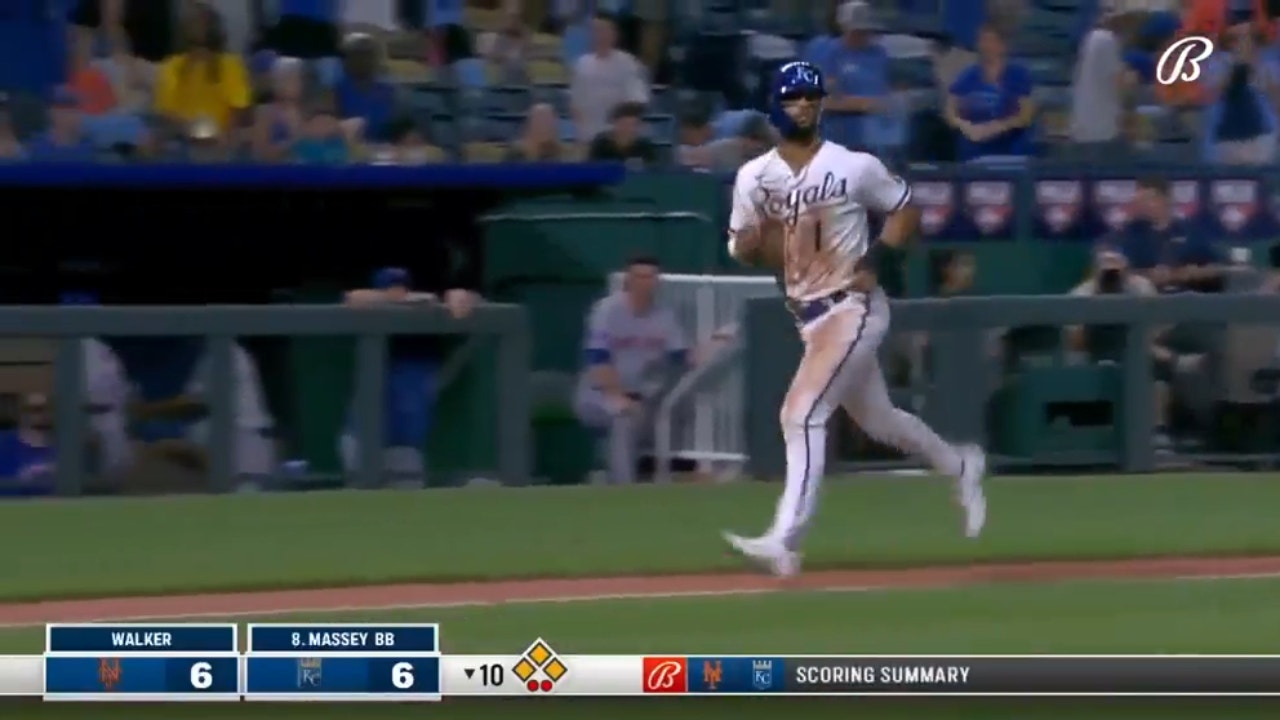 The Royals score the winning run in the 10th inning when the umpires rule that Mets reliever Josh Walker committed a balk