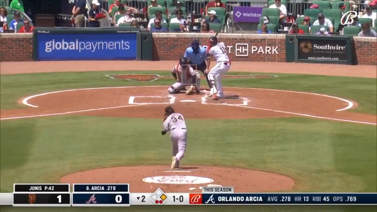 Braves' Orlando Arcia slams a two-run home run against the Giants
