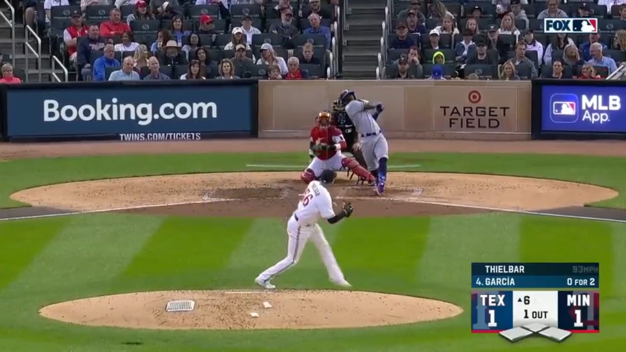 Rangers' Adolis García smacks his 32nd homer of the season against the Twins