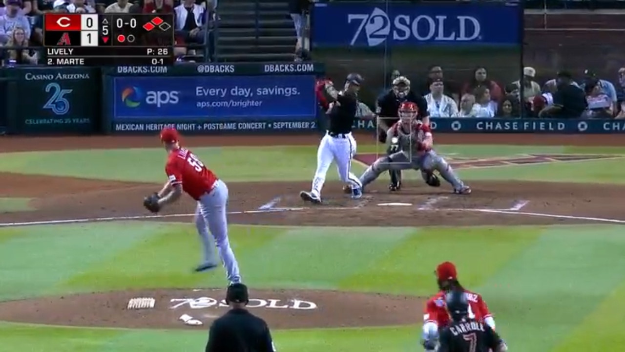 Diamondbacks' Ketel Marte hits a three-run home run against the Reds for his 100th career home run