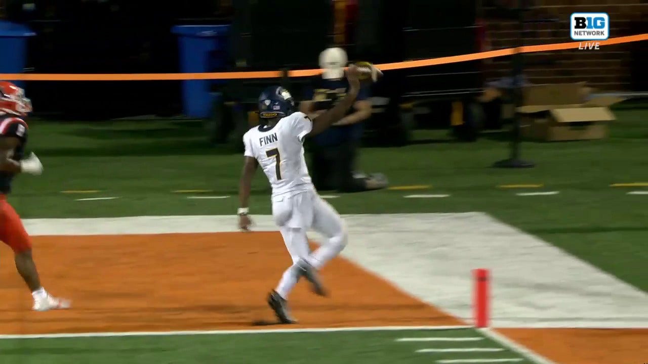 Toledo's Dequan Finn rushes past Illinois' defense en route to an electric touchdown