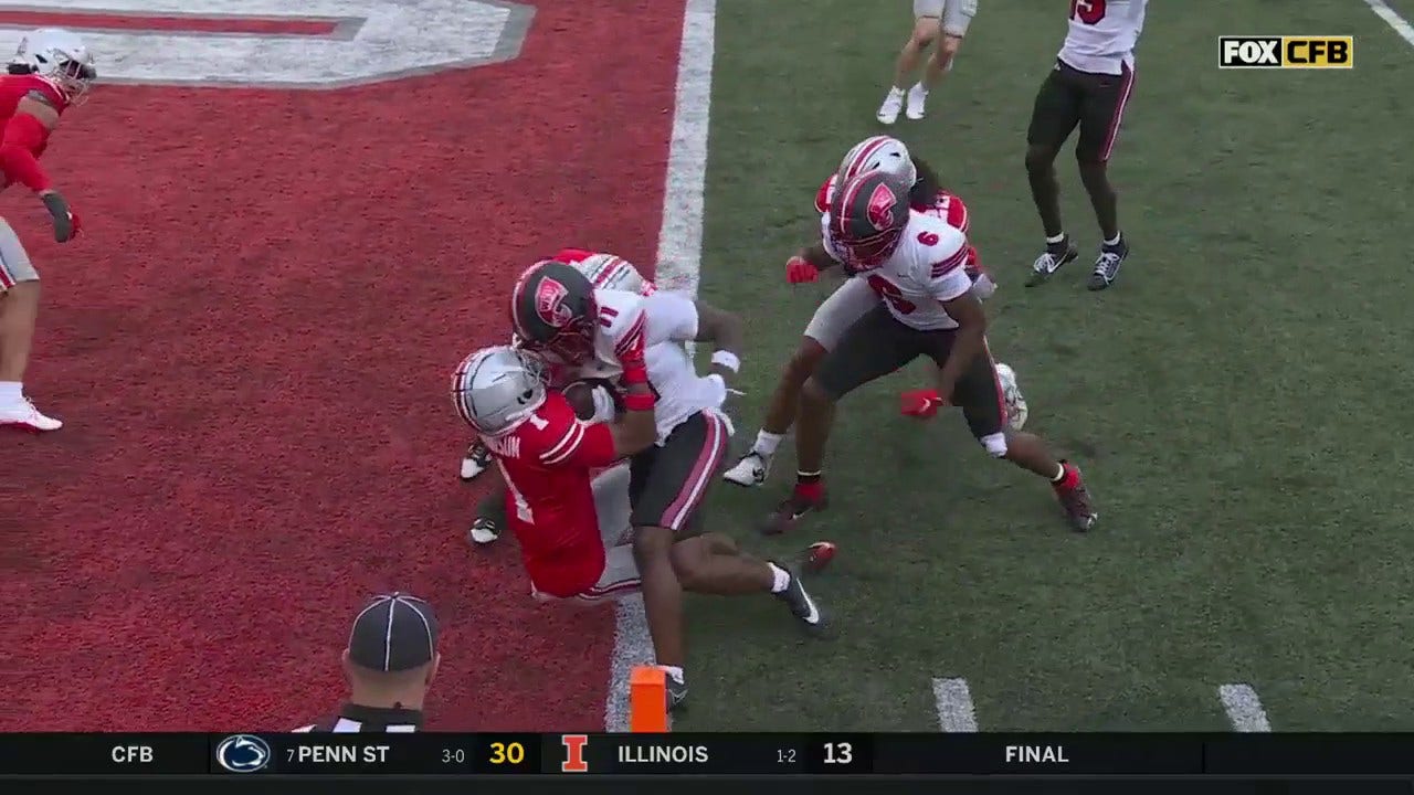 Western Kentucky's Austin Reed connects with Malachi Corley for a two-yard touchdown, trimming Ohio State's lead