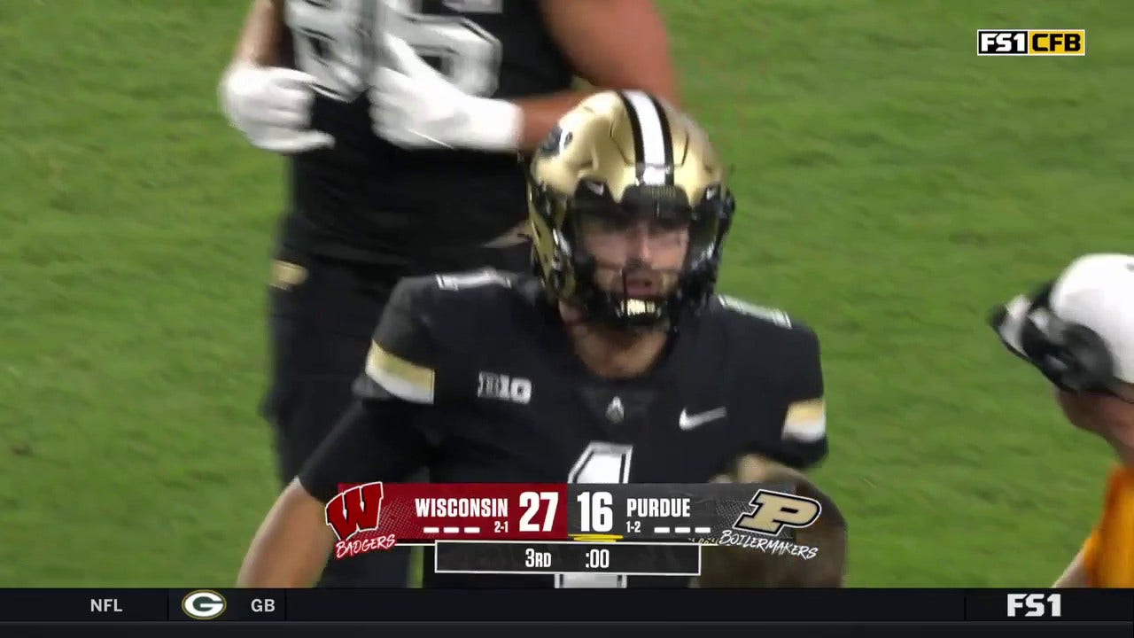 Hudson Card scrambles and scores on a six-yard. rushing TD, helping Purdue trim into Wisconsin’s lead