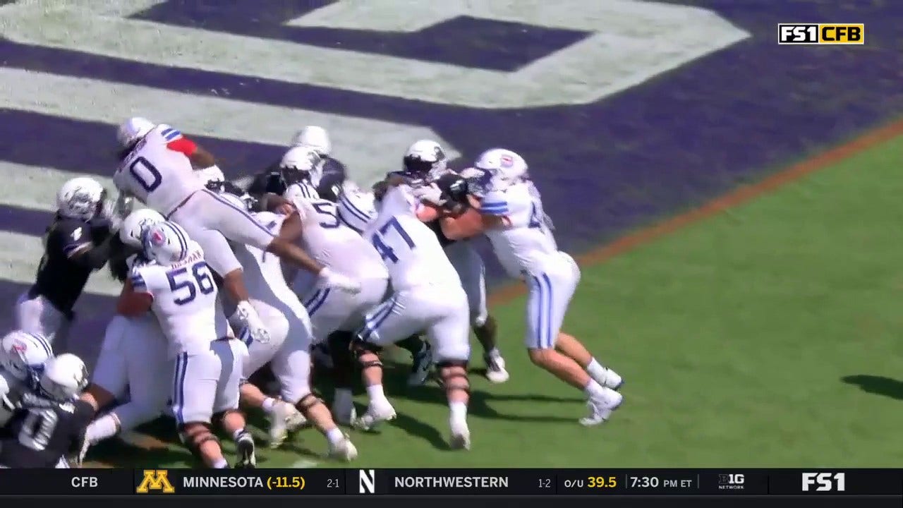 SMU's Camar Wheaton punches it in for a one-yard touchdown vs. TCU