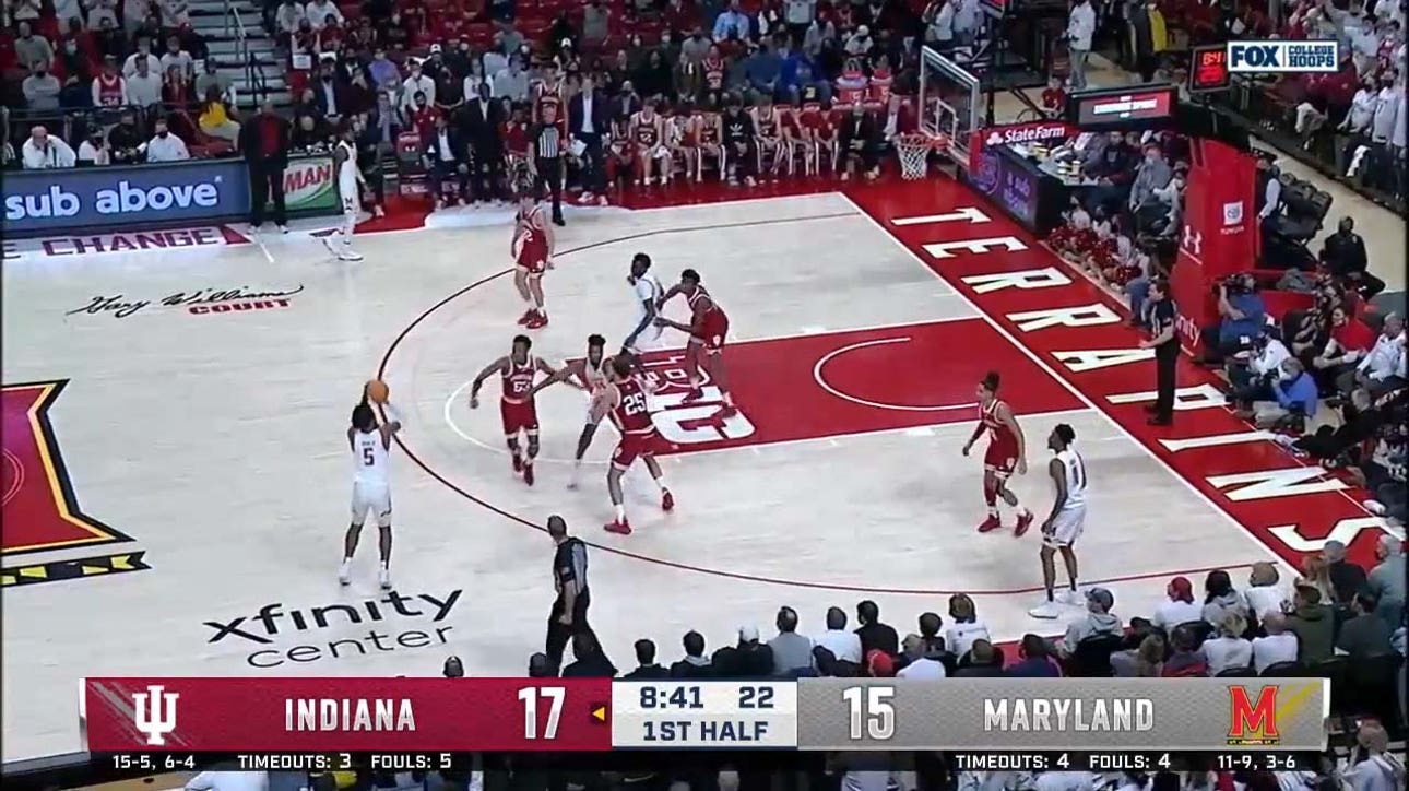 Eric Ayala drains a deep three to give Maryland the lead over Indiana