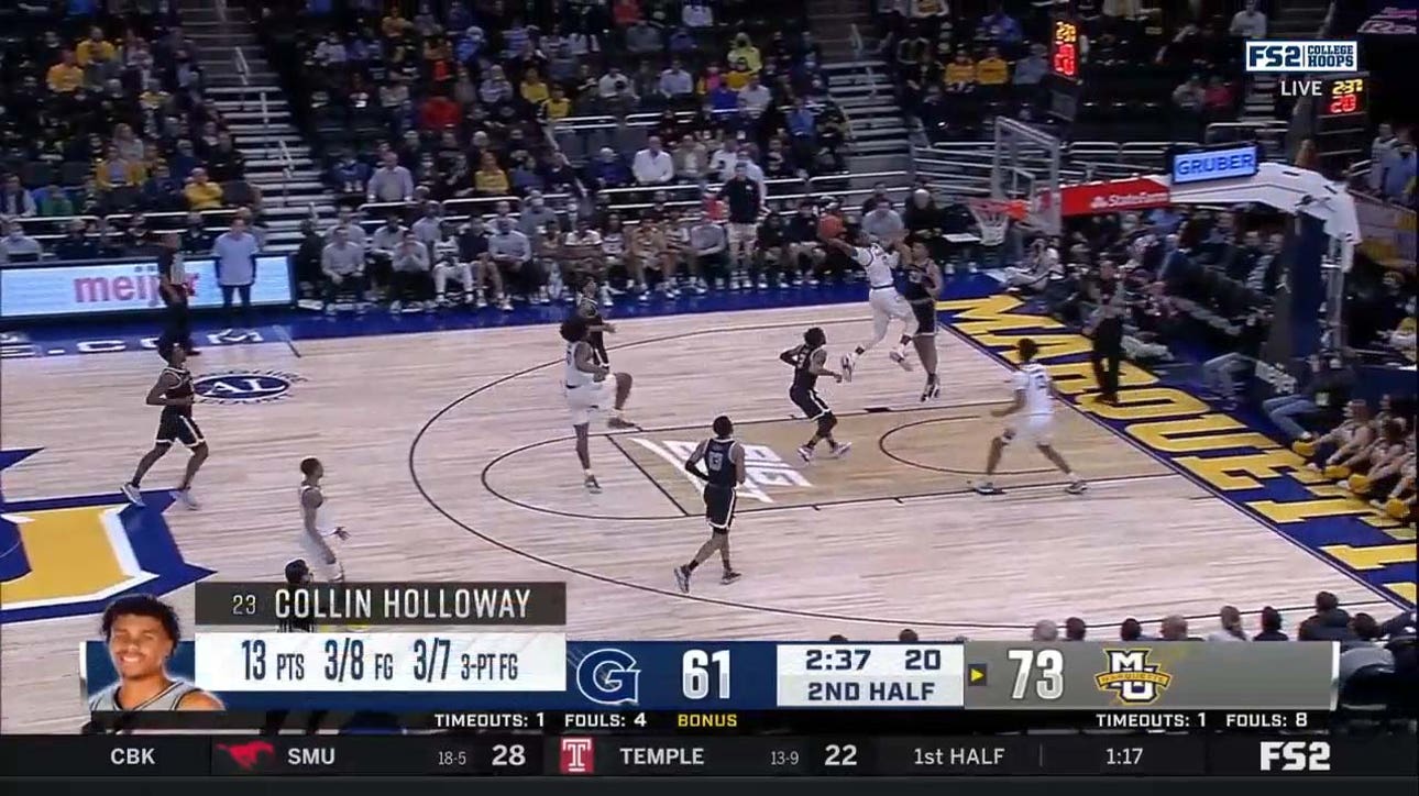 Oliver-Maxence Prosper takes flight and throws down a vicious dunk to keep Marquette ahead of Georgetown