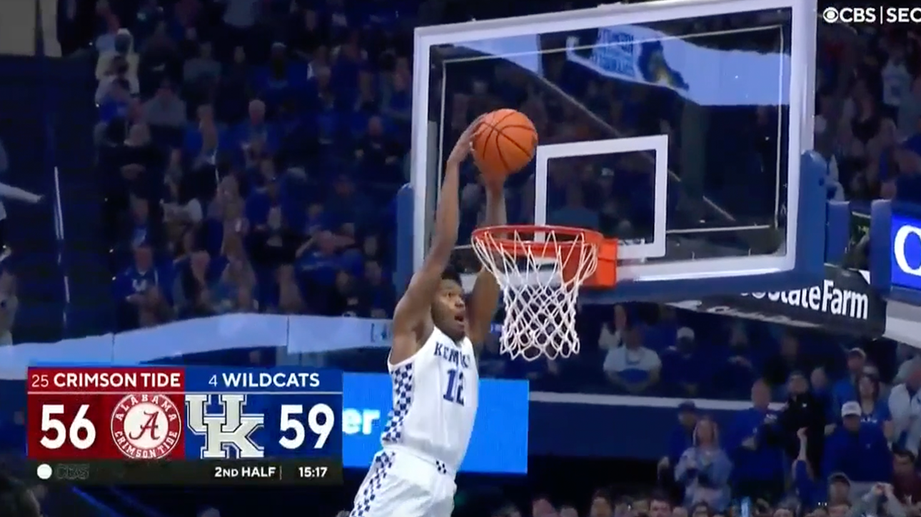 Keion Brooks Jr. gets up to finish the alley-oop jam as Kentucky leads in the second half