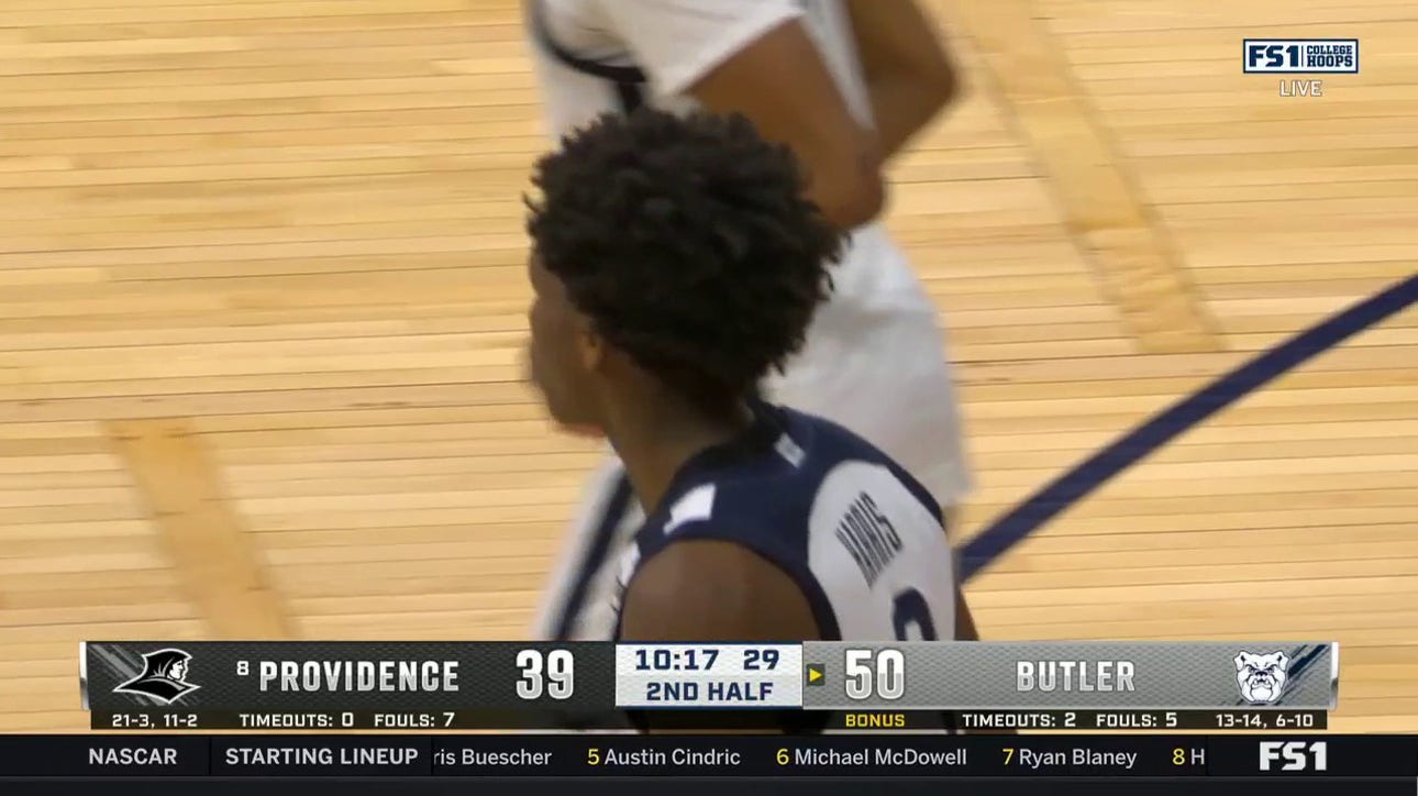 Chuck Harris hits the 3-pointer as the shot clock expires for Butler