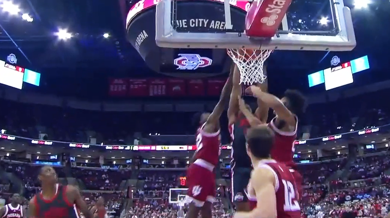 Zed Key delivers a putback jam through contact for Ohio State in the first half