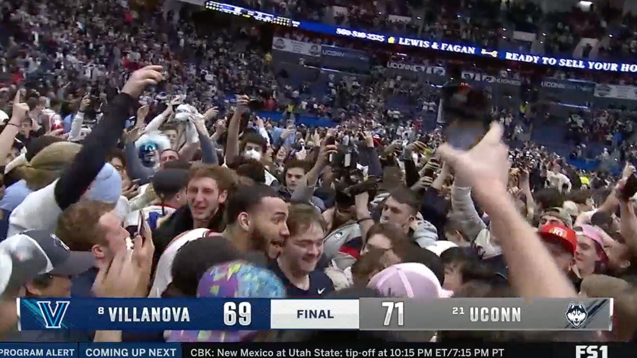 No. 21 UConn upsets No. 8 Villanova and the home crowd stormed the court