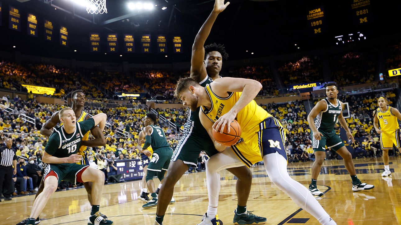 Michigan's Hunter Dickinson dominated the Spartans with a career-high 33 points and 9 rebounds