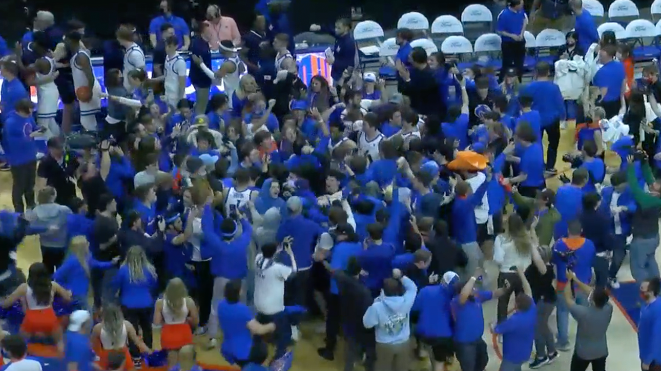 Boise State fans storm the court after historical Mountain West Championship win