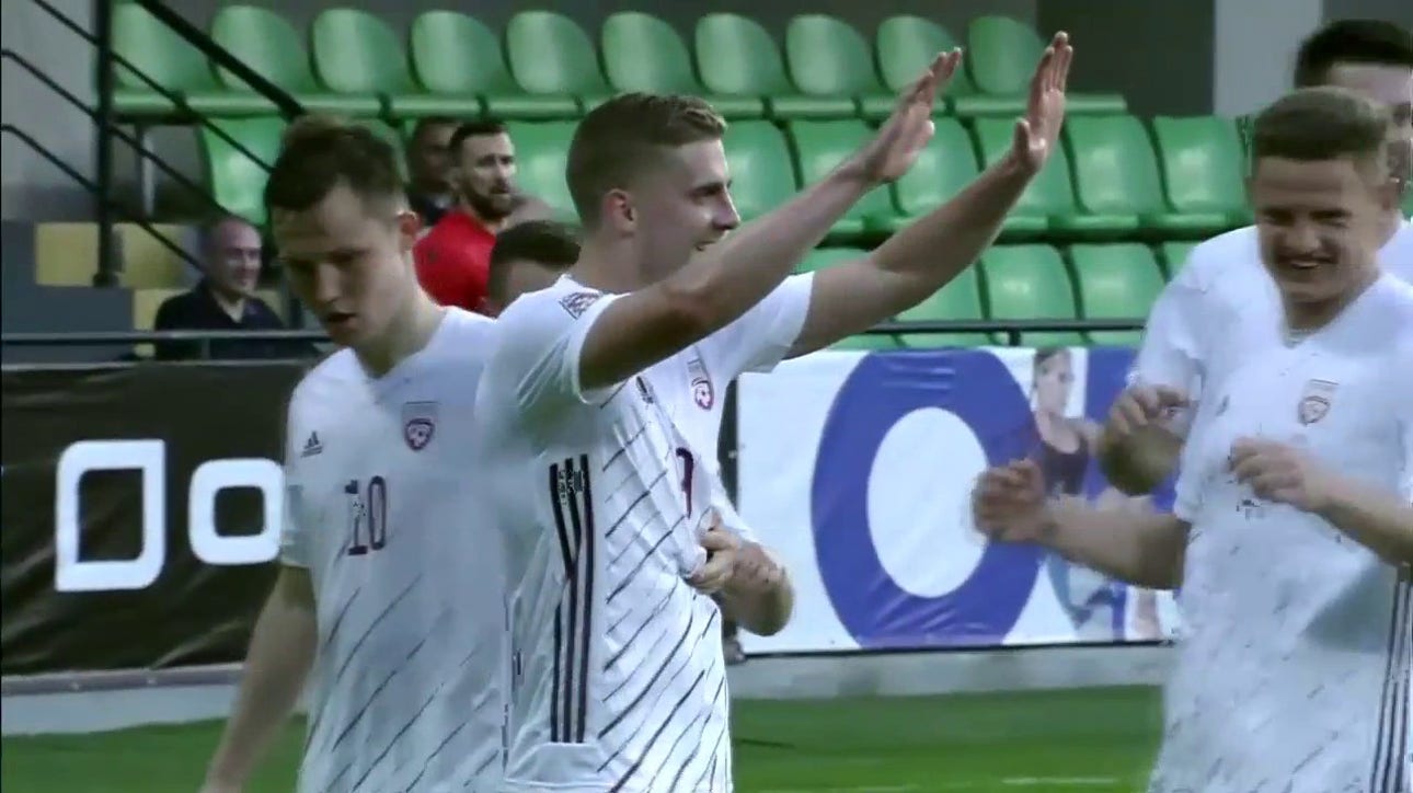 A lucky bounce leads to a goal by Vladislavs Gutkovskis to put Latvia up 3-1
