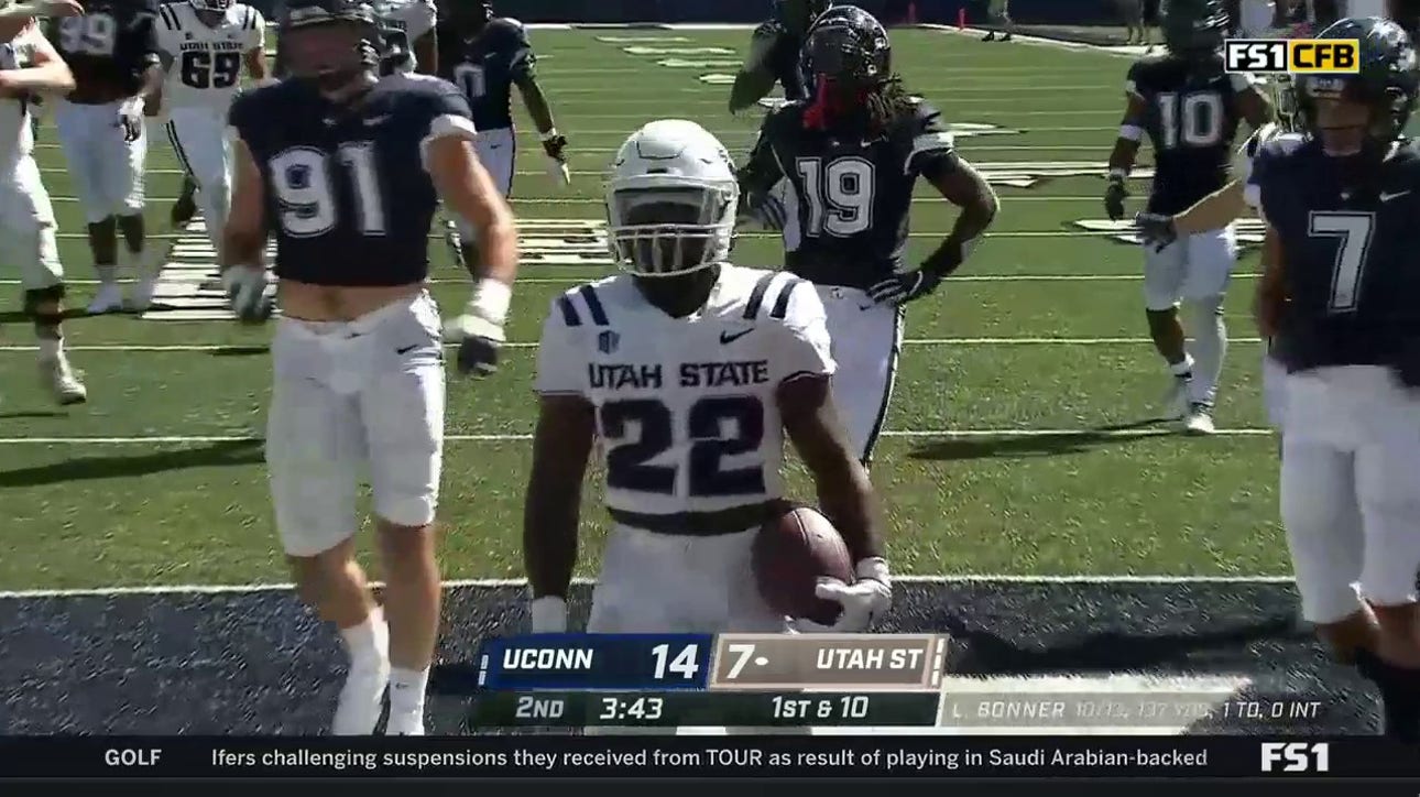 Robert Briggs breaks loose for a 23-yard touchdown to bring Utah State and Uconn to a 14-14 tie
