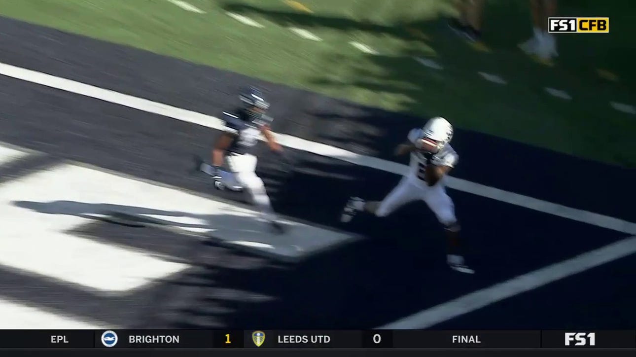 Logan Bonner delivers a precision pass to Brian Cobbs to give Utah State the late 31-20 lead over UConn