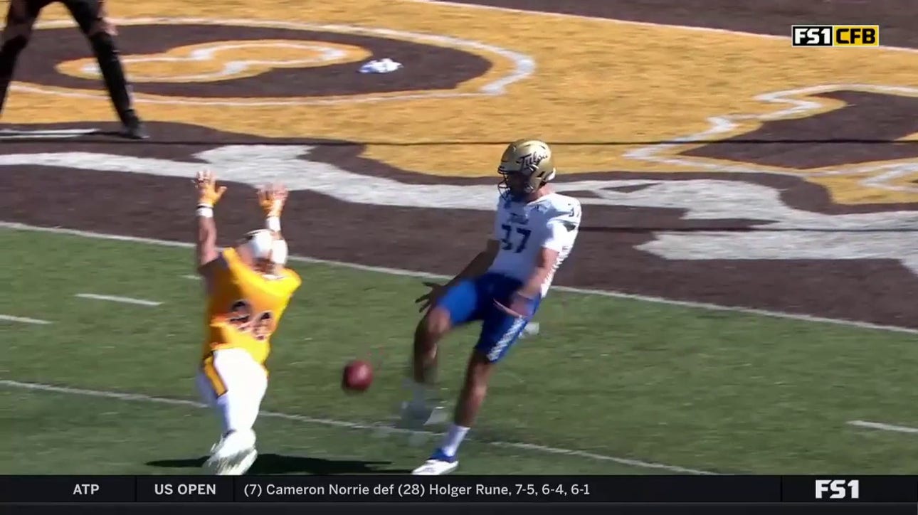 Wyoming blocks the Tulsa punt and recovers it for the touchdown to take the lead