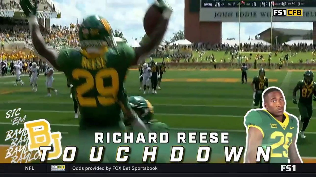 Blake Shapen hands off to Richard Reese for a 52-yard touchdown extending the Baylor lead 35-7
