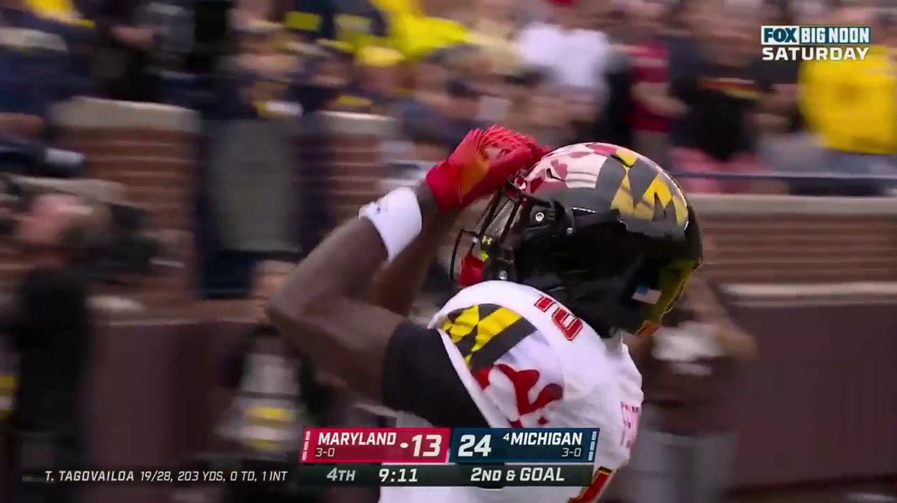 Taulia Tagovailoa connects with Tai Felton on a four-yard TD pass to help Maryland trim into Michigan's lead 