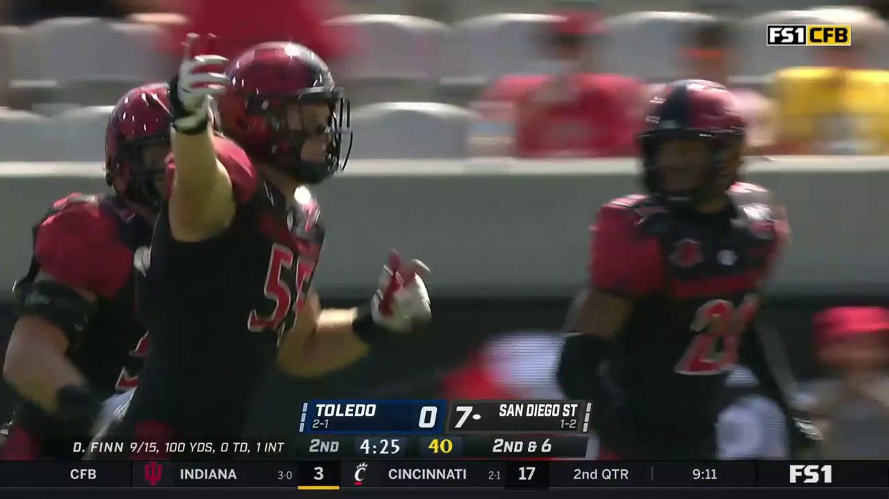 San Diego State's Cooper McDonald recovers a fumble at the SDSU 13-yard line