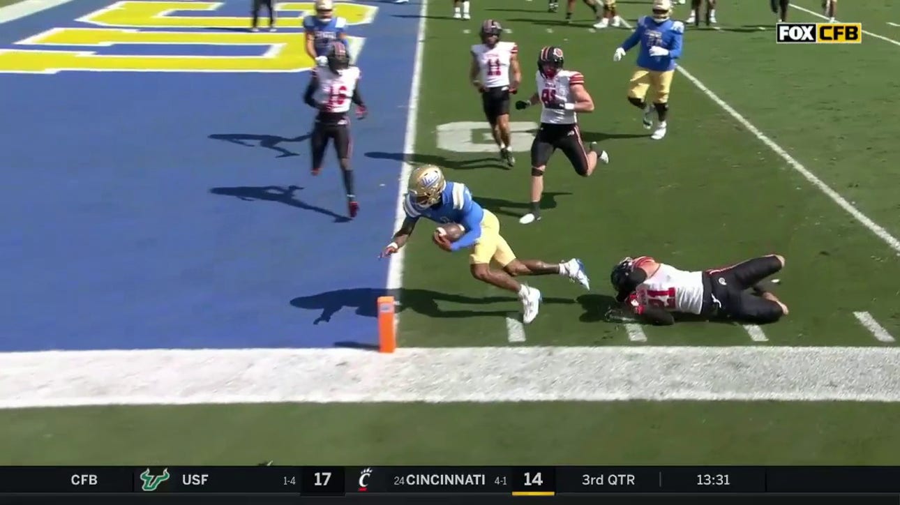 Dorian Thompson-Robinson heads to the pylon for the opening score, UCLA leads Utah 7-0