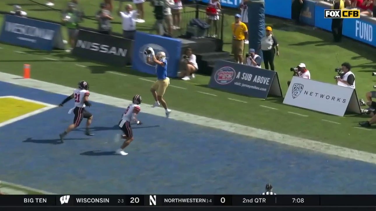Jake Bobo hauls in the touchdown to push the UCLA lead to 14-3