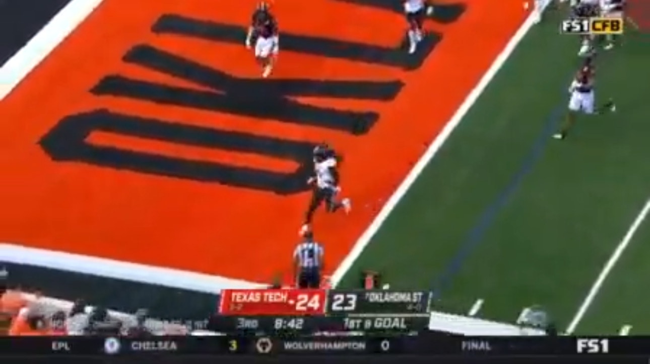 SaRodorick Thompson finds a hole in the defense for a 2-yard TD to put Texas Tech ahead 31-23