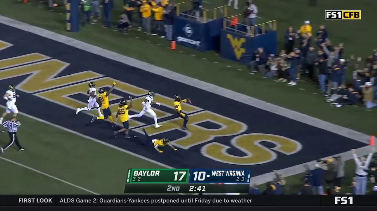 Jasir Cox takes a fumble 65 yards to the house for a West Virginia touchdown