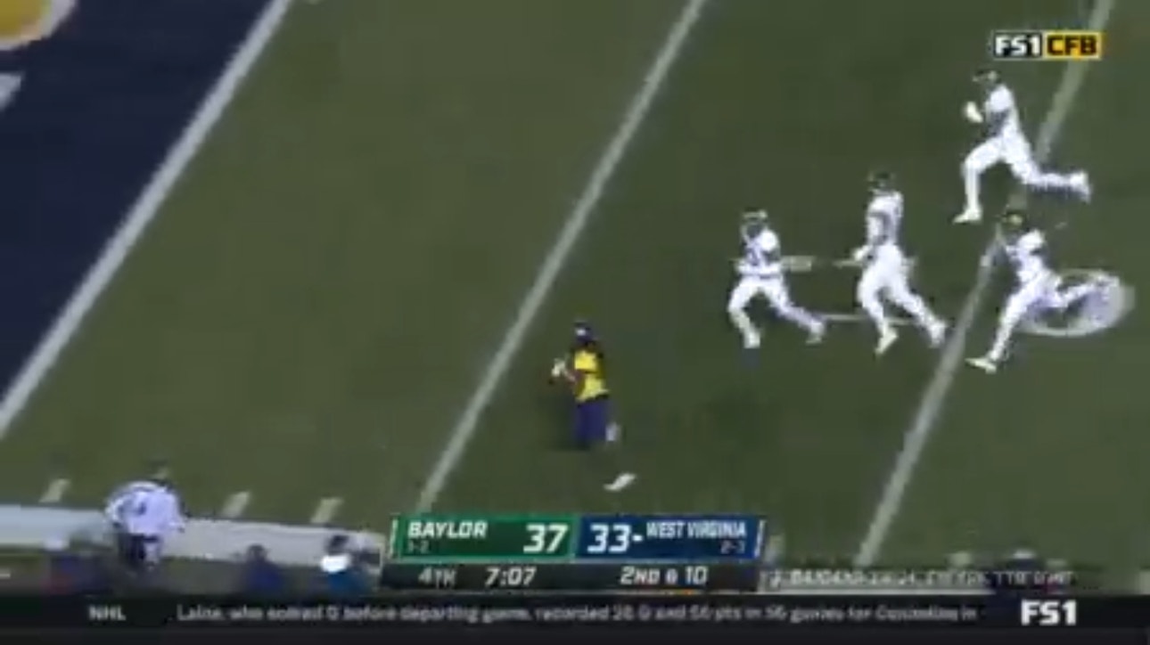 Tony Mathis breaks loose for a 34-yard touchdown to take a 40-37 lead for West Virginia