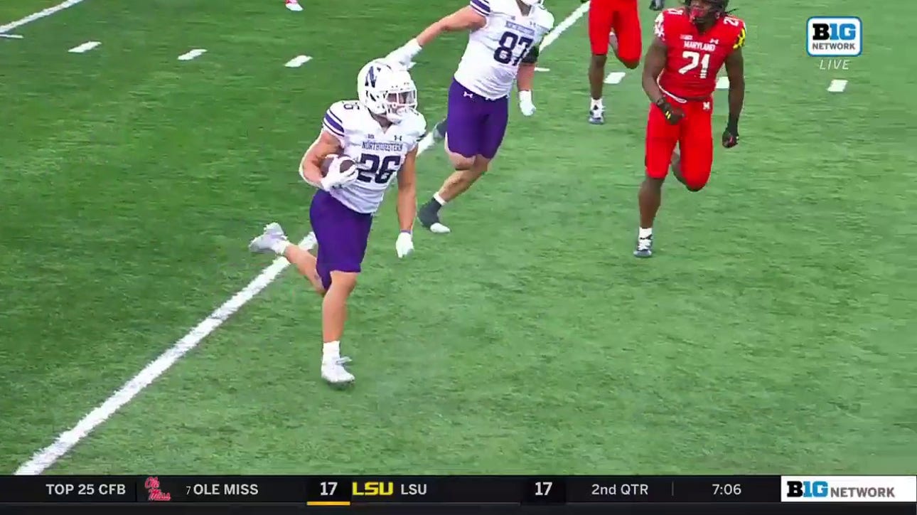 Evan Hull takes the swing pass into the end zone to extend the Northwestern lead to 17-7