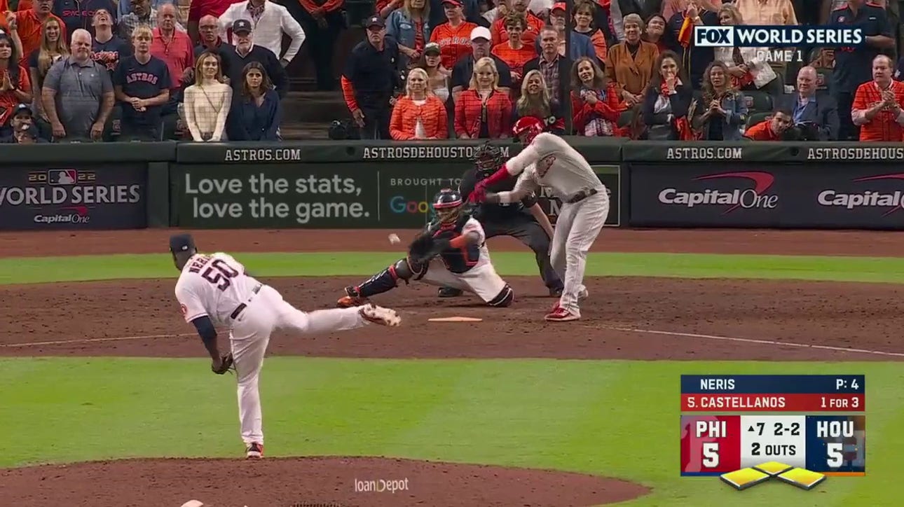 Astros' Hector Neris strikes out Nick Castellanos with the bases loaded to keep the game tied in the seventh inning