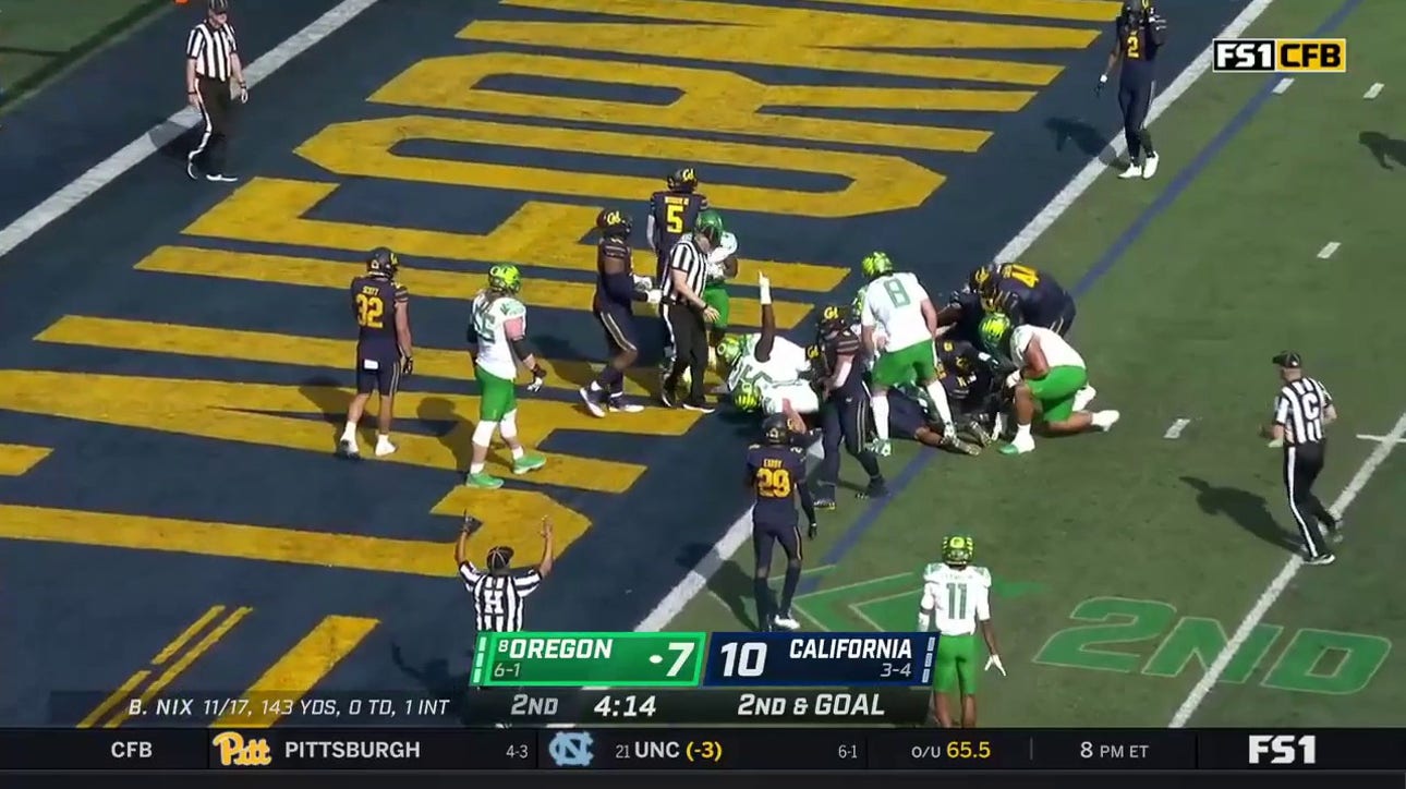 Bo Nix punches in a one-yard touchdown to take a 14-10 lead for Oregon