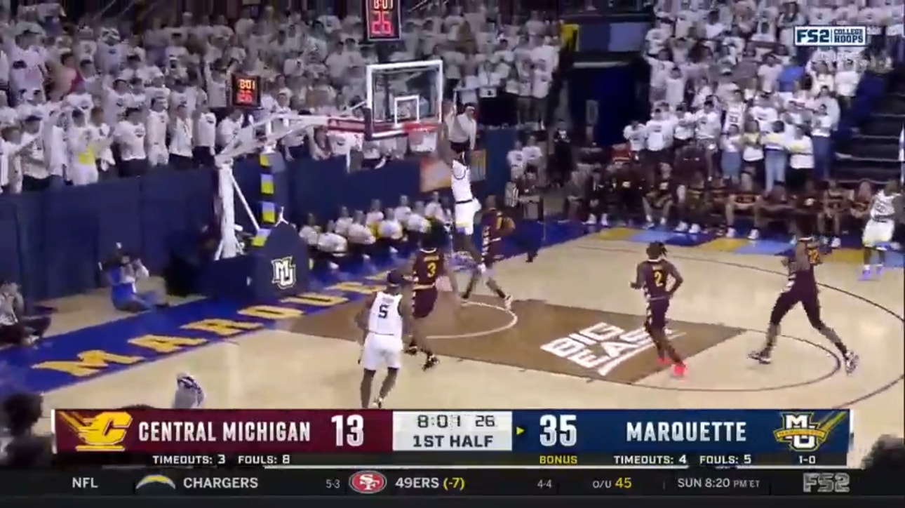 Marquette's Olivier-Maxence Prosper throws down a dunk to add to the Golden Eagles big lead.