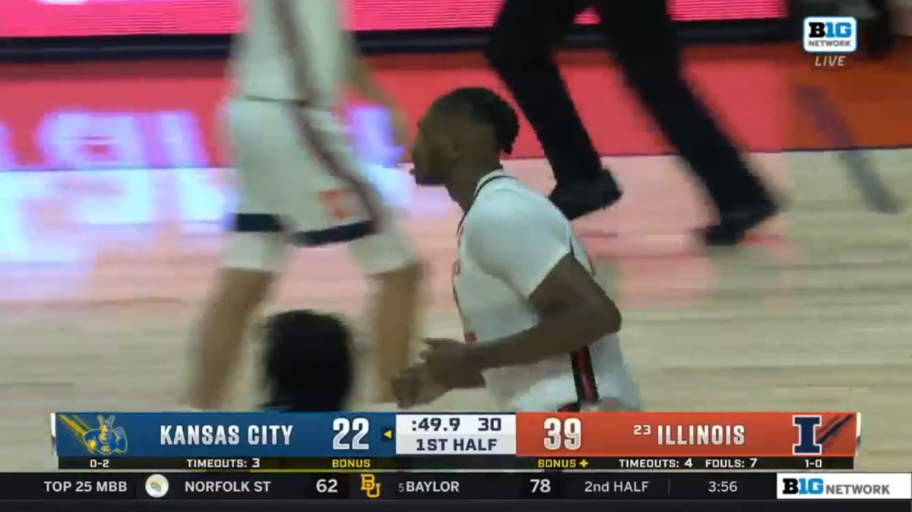 Dain Dainja throws down the big dunk to extend the Fighting Illini's lead to 39-22