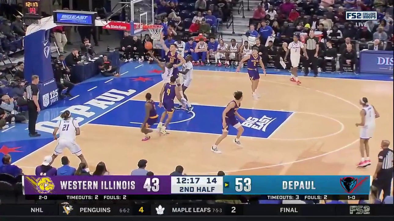 Depaul's Umoja Gibson gets the tough lay up to fall against Western Illinois