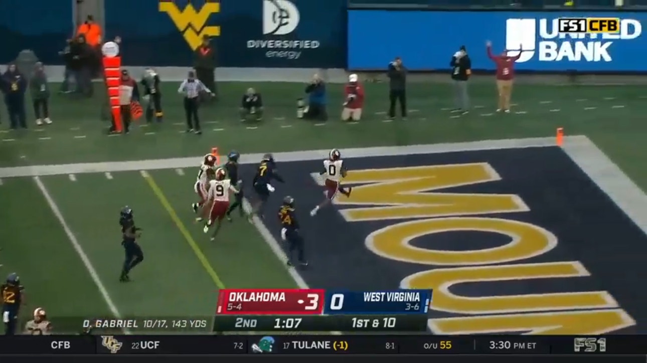 Eric Gray punches into the endzone for a 14-yard rushing TD to extend the lead for Oklahoma