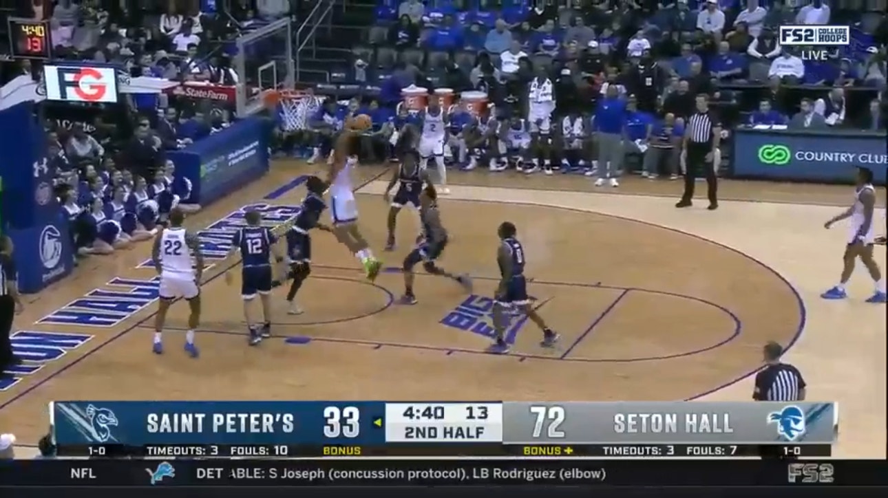 Seton Hall's Tray Jackson dunks on Saint Peter's to hold a strong lead at 75-35