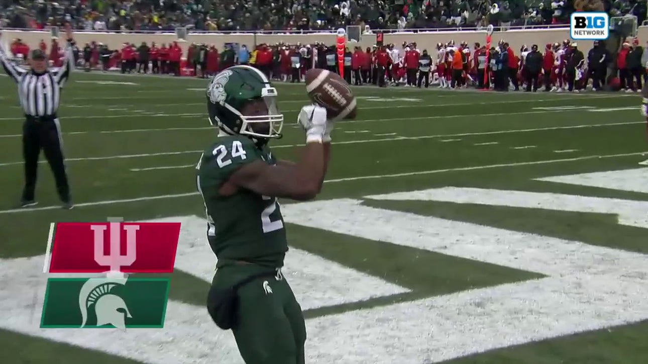 Elijah Collins finds a hole to extend the Michigan State lead