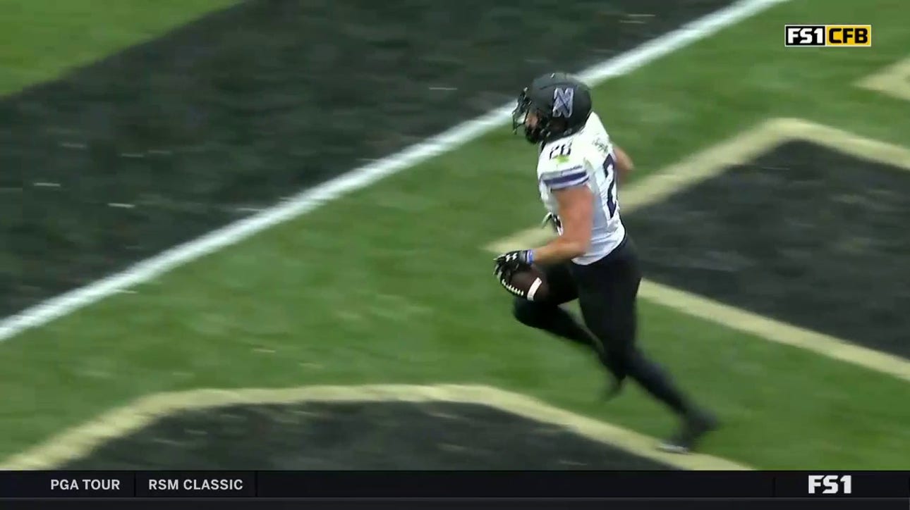 Evan Hull breaks through Purdue's defense for a two-yard rushing TD for Northwestern