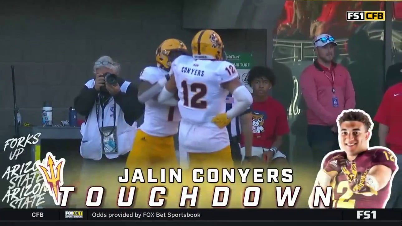 Arizona State's Jalin Conyers catches a four-yard TD from Trenton Bourguet to put the Sun Devils ahead 35-31 over Arizona