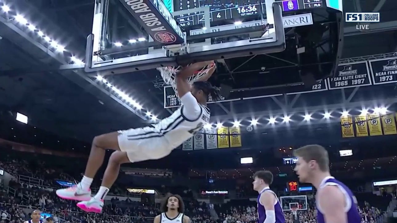 Bryce Hopkins drives the baseline and slams one home to extend Providence's lead vs Albany