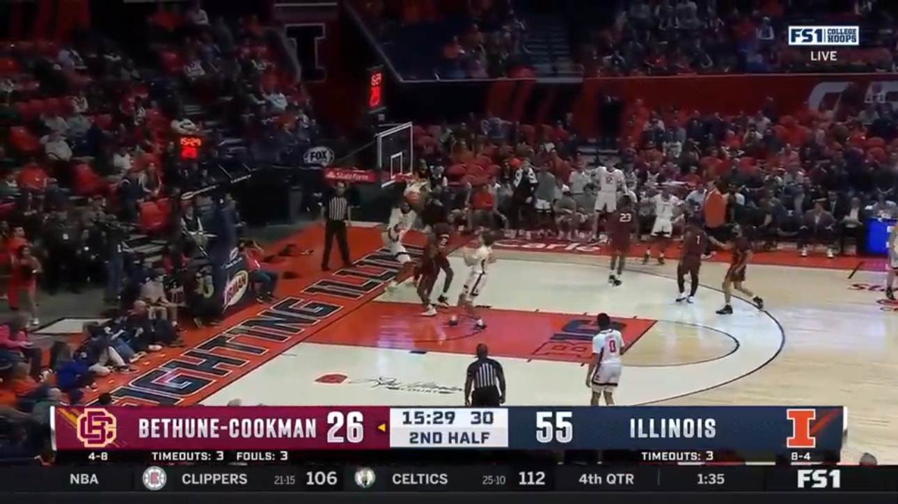 Illinois' Dain Dainja rattles the rim for two-handed dunk against Bethune-Cookman