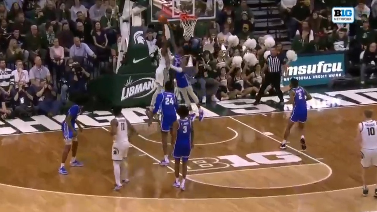 Michigan State's Mady Sissoko throws down two dunks to increase the Spartan's second half lead