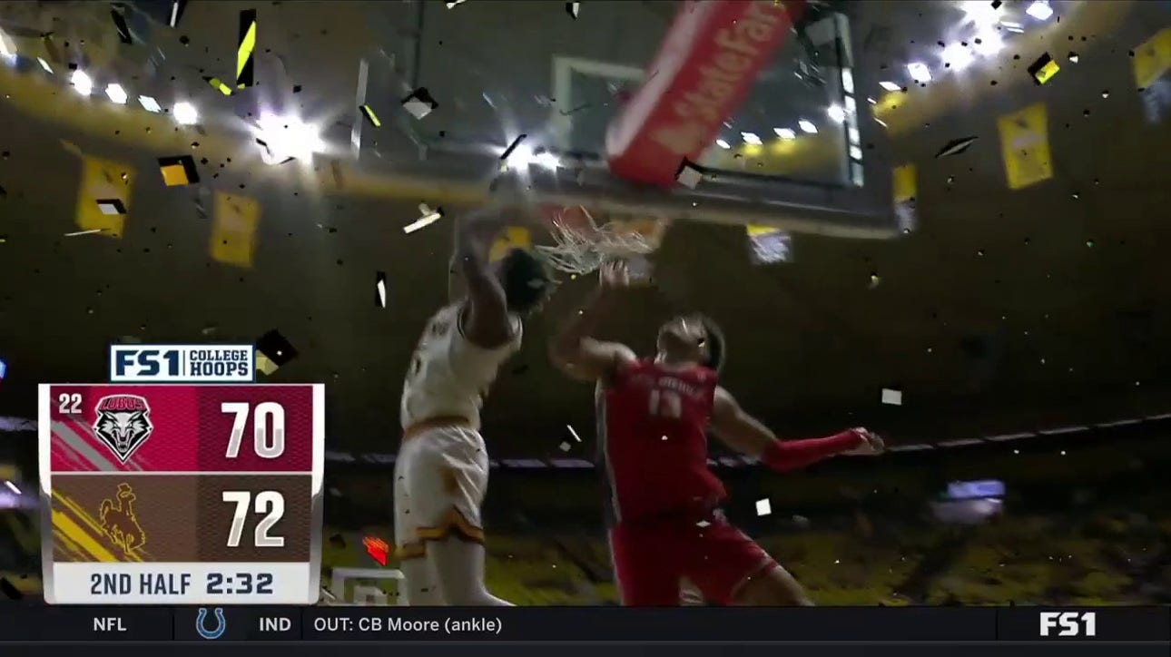 Jeremiah Oden throws down a reverse dunk to give Wyoming a late lead