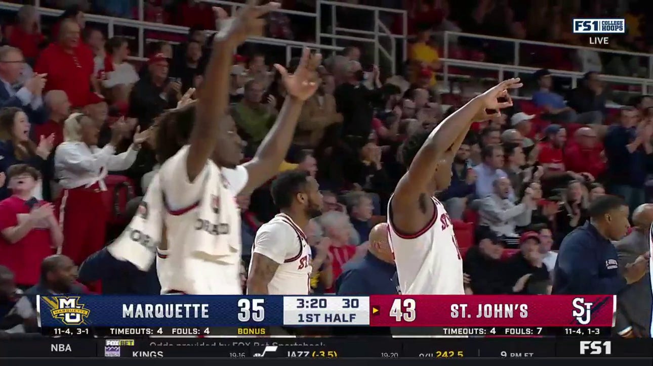 St. John's Dylan Addae-Wusu hits a huge 3-pointer after a leaping save from Joel Soriano