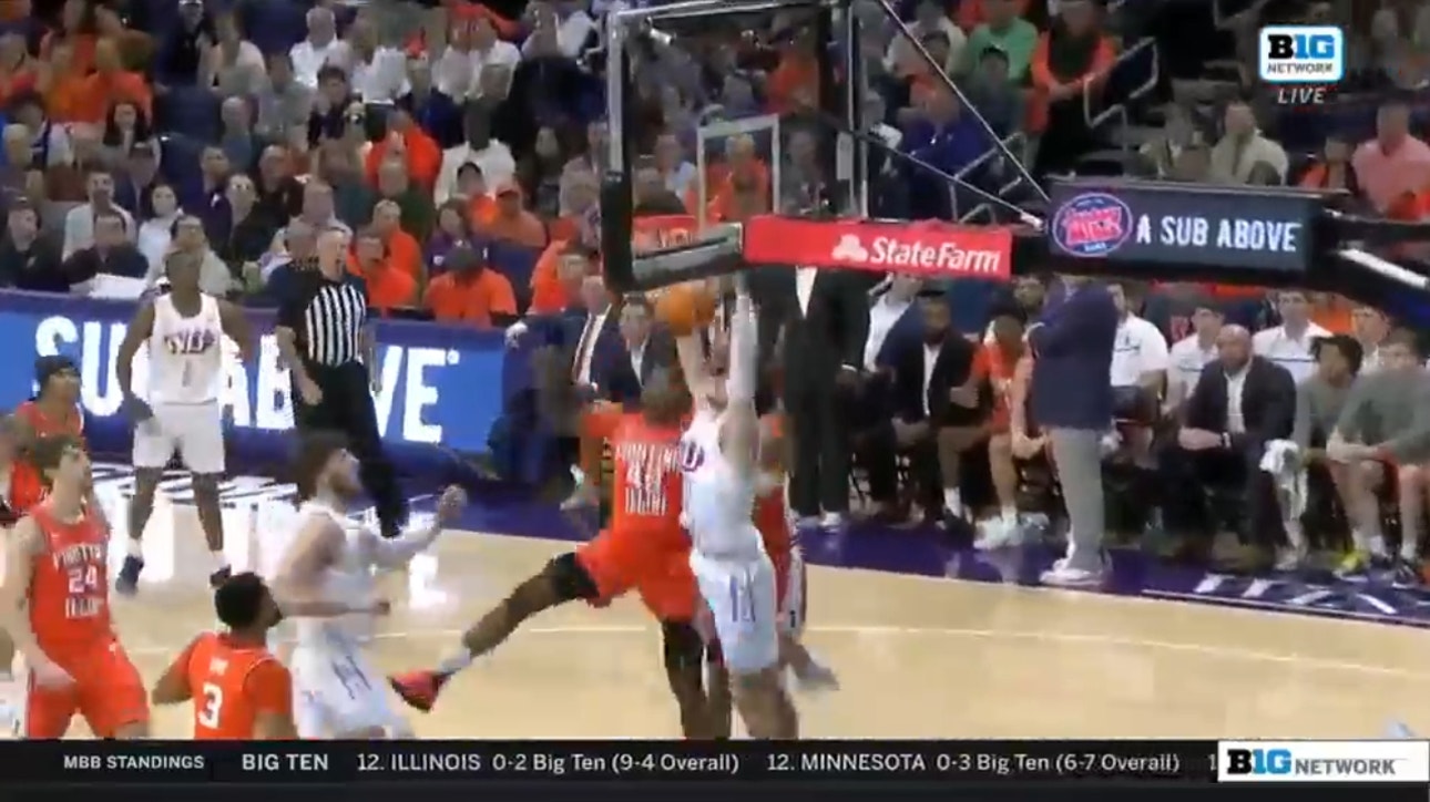 Robbie Beran rattles the rim with a dunk to extend Northwestern's lead against Illinois