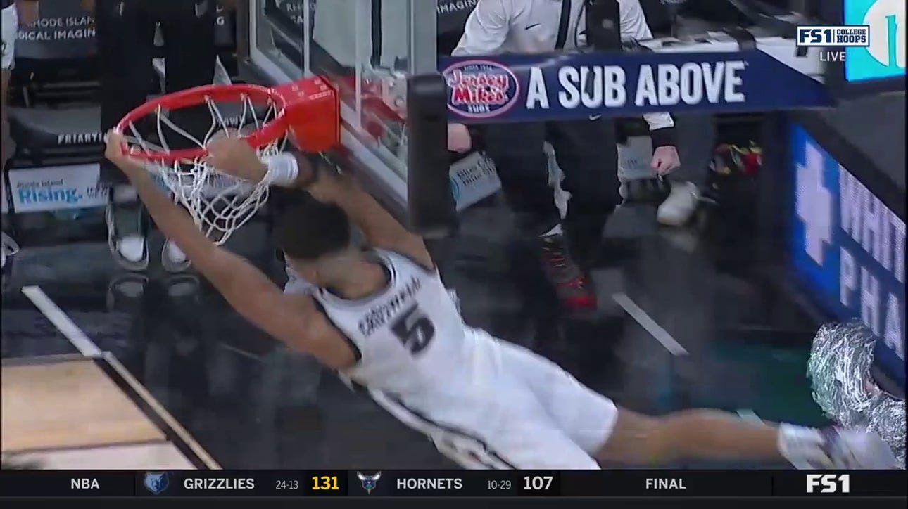 Ed Croswell breaks out and throws down wild fast-break jam to extend Providence's lead over UConn