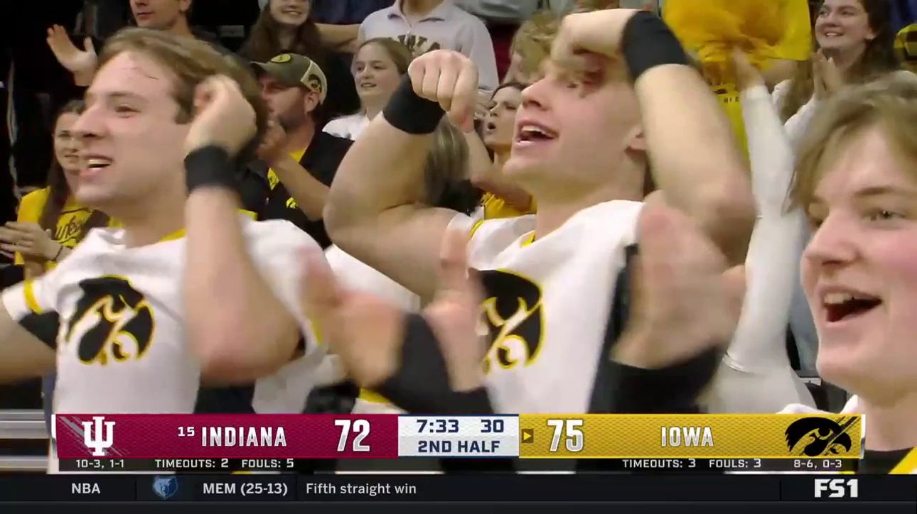 Kris Murray hits the shot inside and draws a foul as Iowa increases its lead over Indiana