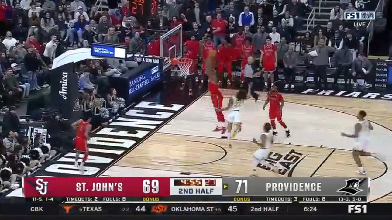 Joel Soriano slams home a dunk after a fast break as St. John's and Providence are close late